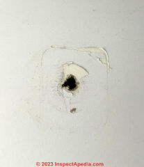 hole in wall in 1963 home (C) InspectApedia.com Bobby