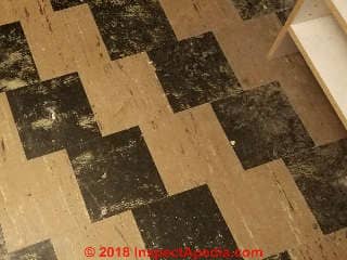 Asbestos-containing 9x9" floor tiles from a 1950's home (C) InspectAPedia.com W