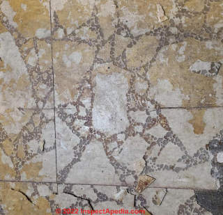 asbestos-containing floor tile (C) InspectApedia.com Sam