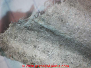 Corrugated asbestos paper pipe insulation, Gramercy Park NY asbestos test results (C) Daniel Friedman at InspectApedia.com