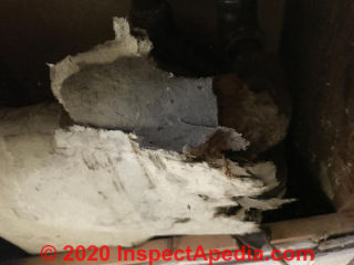 Asbestos pipe insulation (C) InspectApedia.com Lat