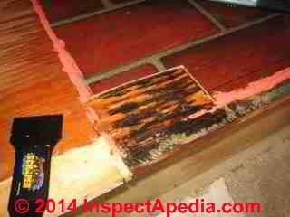 Brick pattern vinyl sheet flooring from 1973 containing asbestos in flooring & mastic (C) Inspectapedia RD