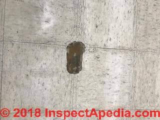 Damaged VAT flooring - asbestos hazard (C) InspectApedia.com JJ