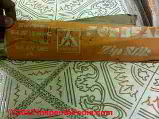 Vinyl asbestos self adhesive floor tiles containing CHrysotile asbestos (C) D Friedman PT