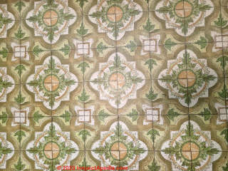 green and orange pattern asbestos flooring (C) InspectApedia.com Ashley H