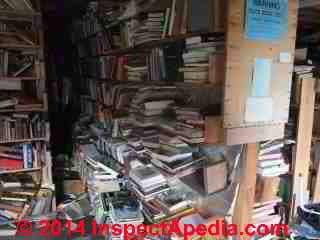 Book hoarding hazards in a building in Mabbettsville NY (C) Daniel Friedman 2013