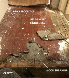 Red brick floor tiles & older linoleum (C) InspectApedia.com Courtney G