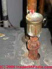 Air bleeder valve atop a hot water heating boiler (C) Daniel Friedman