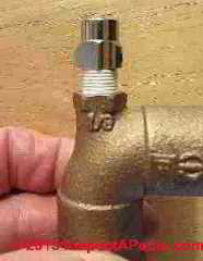 Air bleeder valve in proper upright position (C) Daniel Friedman at InspectApedia.com