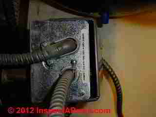 Buzzing aquastat relay © D Friedman at InspectApedia.com 