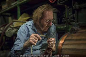 Conrad Milster in the Pratt steamroom machine shop (C) InspectApedia.com & Dustin Cohen