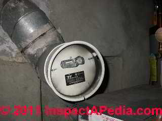 Oil fired water heater with a backpressure sooting problem (C) Daniel Friedman