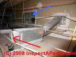 Hidden problems above suspended ceilings © D Friedman at InspectApedia.com 
