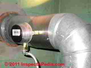 Automatic flue damper on oil fired heater (C) Daniel Friedman