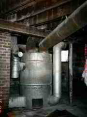 PHOTO of an Octopus heating furnace, originally coal fired, converted to natural gas fuel.