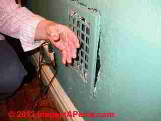Wall warm air supply register in a NYC apartment (C) D Friedman