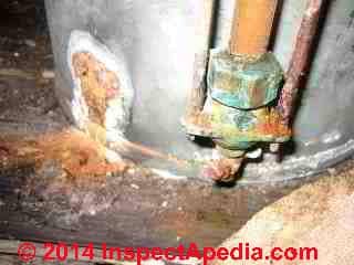 Leaky attic expansion tank (C) InspectApedia - Hein