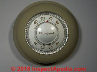 Honeywell traditional T87 Round wall thermostat, analog (C) Daniel Friedman at InspectApedia.com