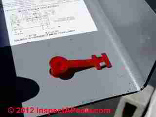 Reset button mechanics on a Honeywell R8182 Aquastat (C) D Friedman