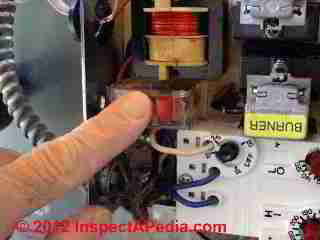 Honeywell R8182 internal reset switch assembly © D Friedman at InspectApedia.com 