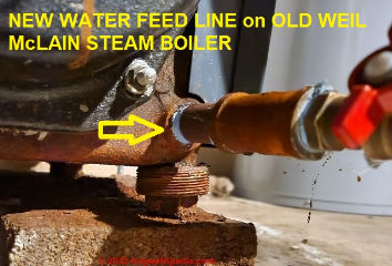 Repair that was possible: repalcing a water feed pipe on an old Weil McLain Steam Boiler  (C) Daniel Friedman at InspectApedia.com Lukacher