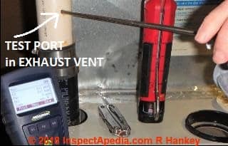 Testing for carbon monoxide level in the exhaust of a Tempstar condensing gas furnace (C) In spectApedia.com Roger Hankey