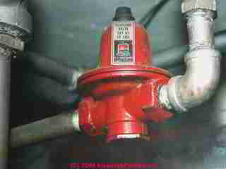 Water feeder valve for a hot water boiler