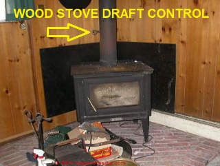 Draft control on a wood burning heater (C) InspectApedia.com
