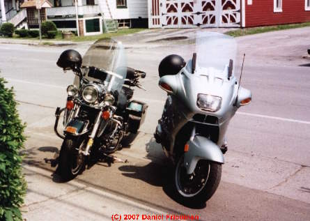 Photograph of a Harley Davidson Road King FLHRI and BMW R1100RT