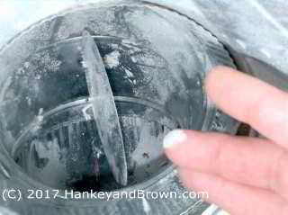 Drywall dust in metal ductwork (C) Roger Hankey at InspectApedia.com