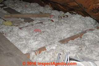 Apparent mineral wool in thick strands  (C) InspectApedia.com John Lenig