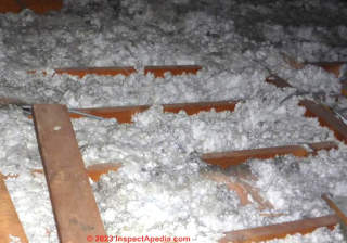 rock wool insulcation in attic (C) InspectApedia.com Sam