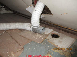 Hazards from falling loose-fill vermiculite insulation (C) InspectApedia.com David Grudzinski