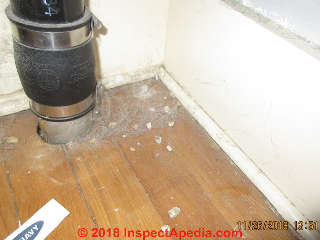 Vermiculite found on closet floor - now look up (C) Inspectapedia.com David Grudzinski