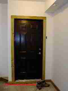 Steel fire door between garage and living area (C) D Friedman