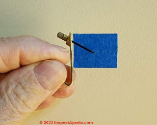 how to hang a picture tips (C) InspectaApedia.com DJF