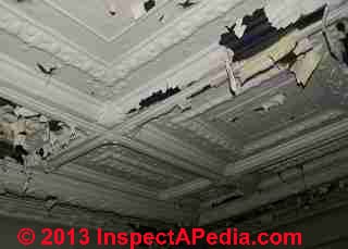 Water damaged tin ceiling (C) InspectAPedia JN