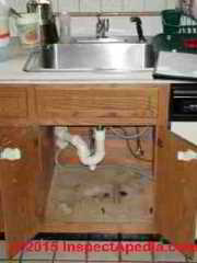Evidence of mice below the kitchen sink (C) Daniel Friedman