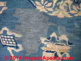 What caused the light coloure "Stains" on this rug ? Diagnosis suggestions (C) InspectAPedia BB