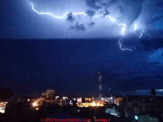 Horizontal and vertical lighting bolts light up the sky over central Mexico (C) InspectApedia.com Isabel Sanchez