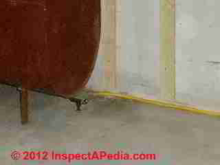 Flexible copper oil piping new installation, protected (C) D Friedman