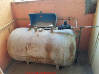 Propane tank old enough that the gas company would not re-fill it - it was replaced (C) Daniel Friedman at InspectApedia.com