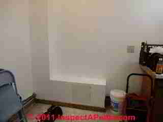 Plumbing chase covered with fire-rated Drywall (C) D Friedman