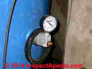 Water pressure gauge installed on a water tank air volume control © Daniel Friedman
