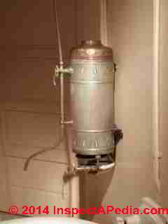 Gas fired water heater, antique Barcelona Spain Gaudi Apartments (C) Daniel Friedman