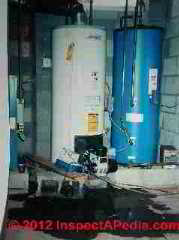 Leaks at a double water heater installation (C) D Friedman