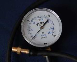 Gas pressure gauge reading in inches of water column at InspectApedia.com