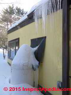 Ice cascading over an LP propane gas tank and regulator, New York (C) Daniel Friedman