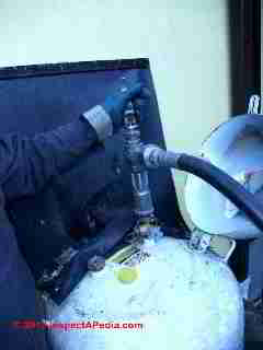 LP gas tank being filled by Bottini Fuel, Poughkeepsie NY (C) Daniel Friedman