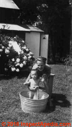 Author having a bath in a galvanized washtub  (C) Daniel Friedman 